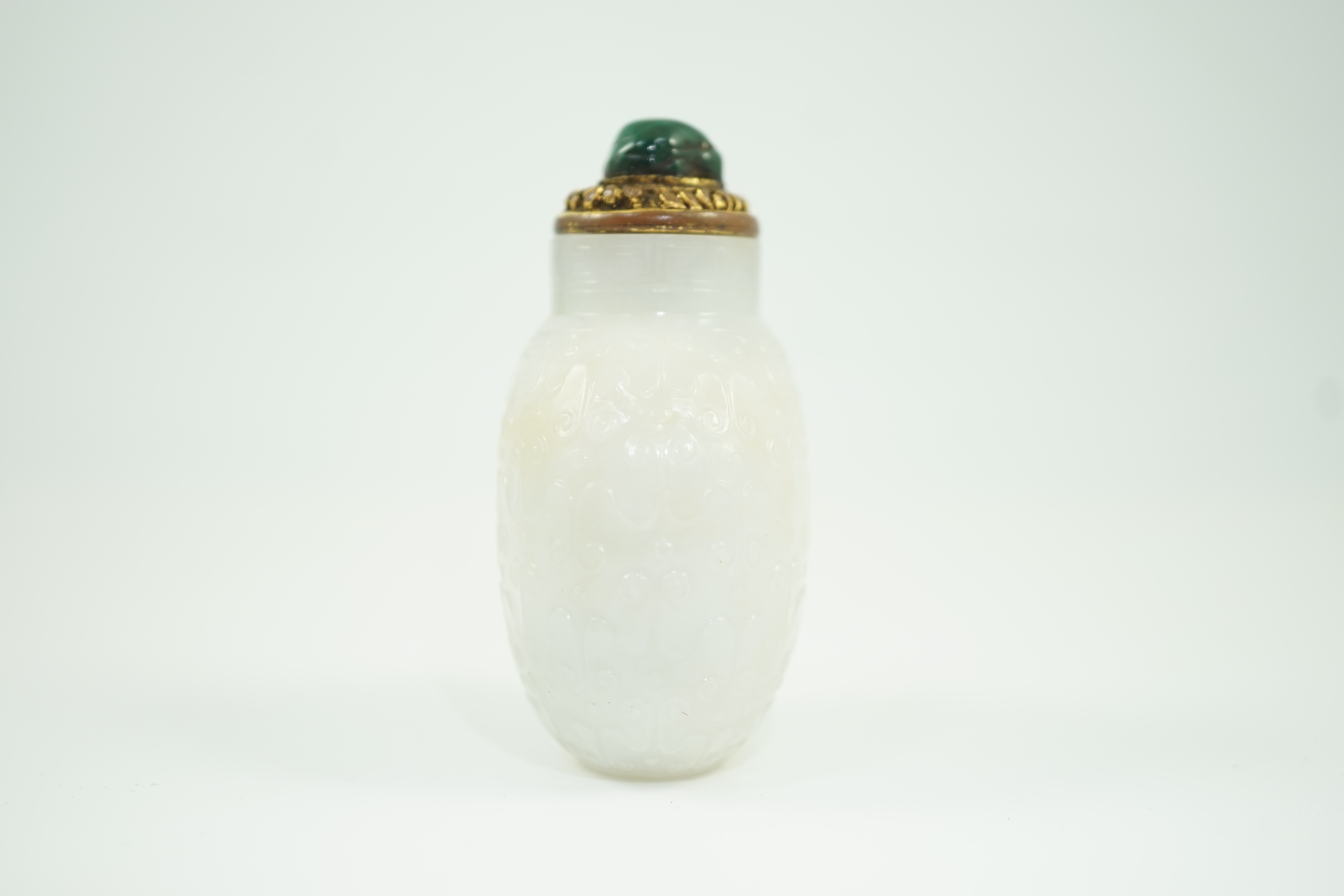 A good Chinese archaistic white jade snuff bottle, 1780-1850